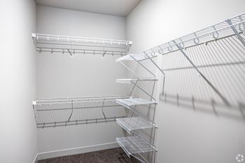 Empty shelves in a white room.